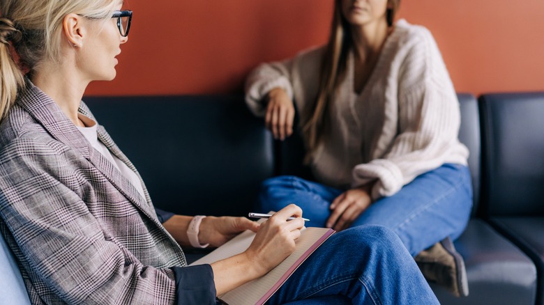 woman talking with her therapist