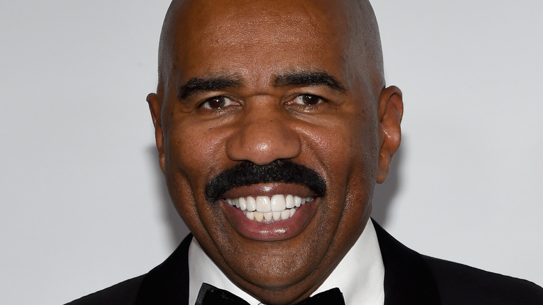 Steve Harvey smiling at an event