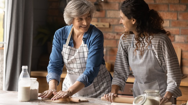 Multi-generational women cooking together