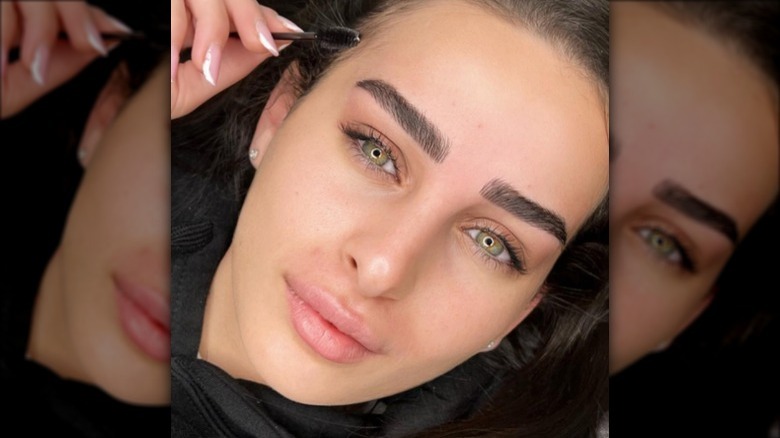 woman with straight eyebrows