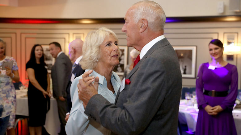 Queen Camilla dancing with former Strictly Come Dancing judge Len Goodman