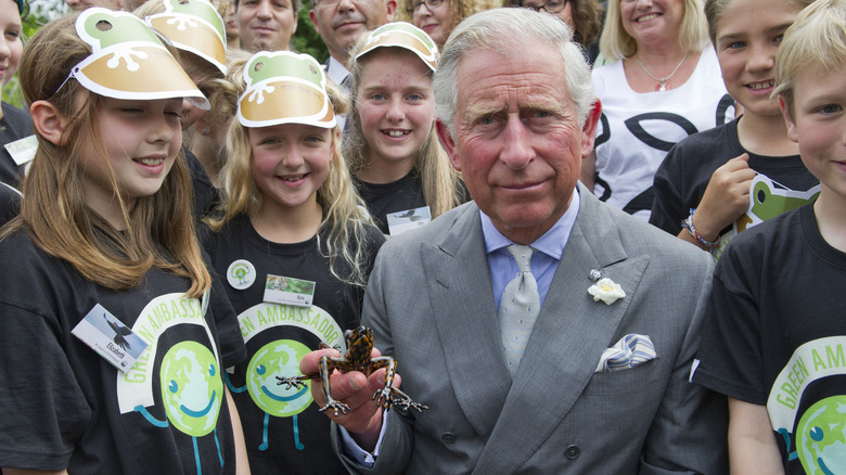 Prince Charles with a frog 