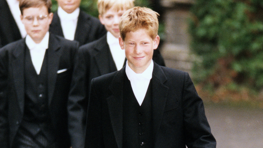 Prince Harry walking with other schoolboys