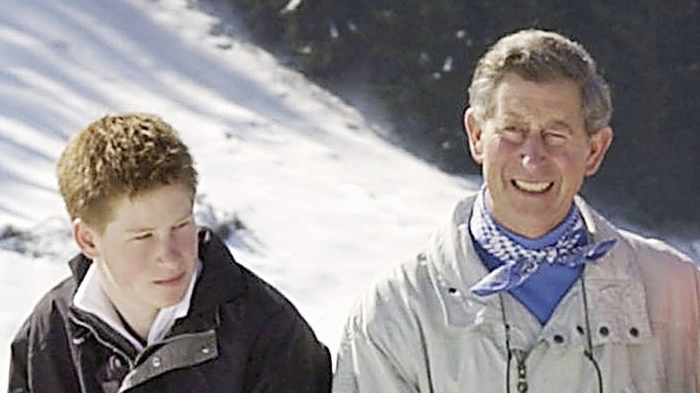 Prince Harry as a teen posing with Prince Charles