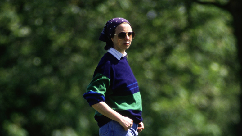 Younger Princess Anne in jeans, sunglasses