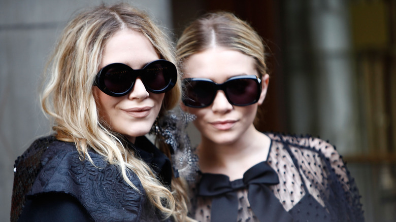 The Olsen twins wearing sunglasses