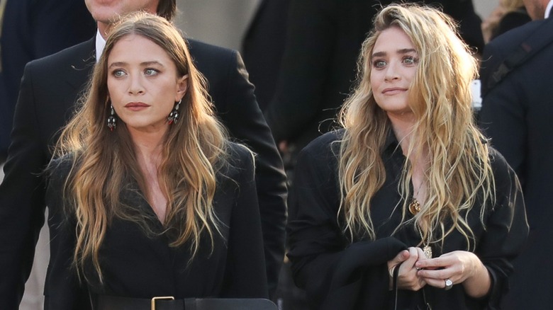 The Olsen twins walking together