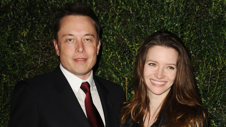 Elon Musk and Talulah Riley posing for photos