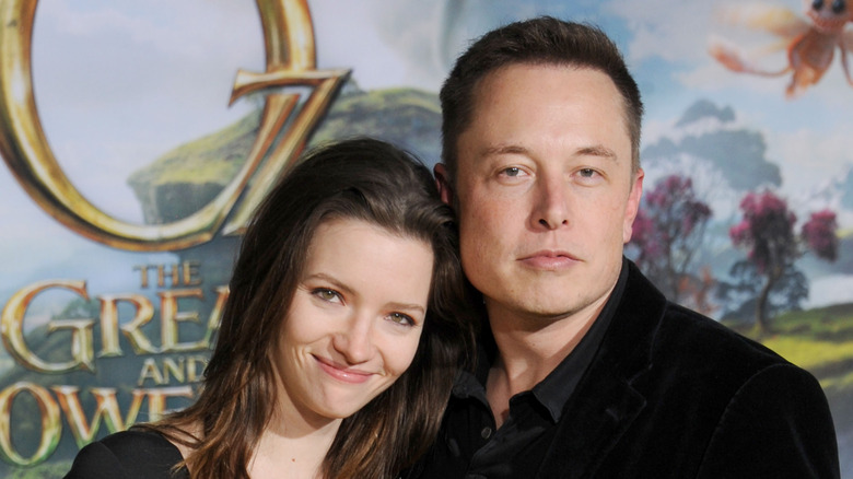 Elon Musk and Talulah Riley posing for photos