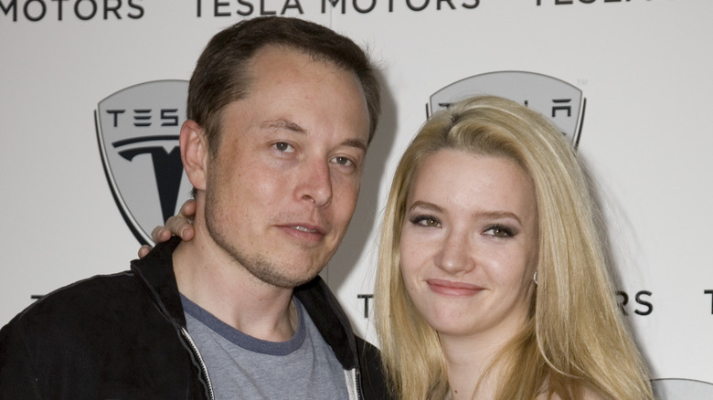 Elon Musk and Talulah Riley posing for photos