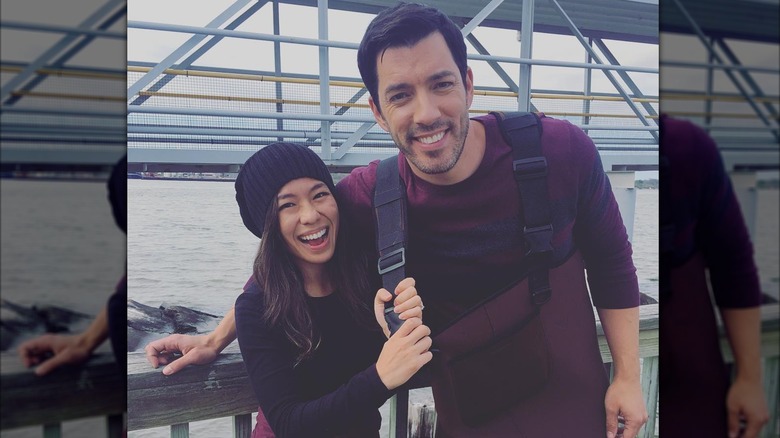 Linda Phan and Drew Scott smiling together