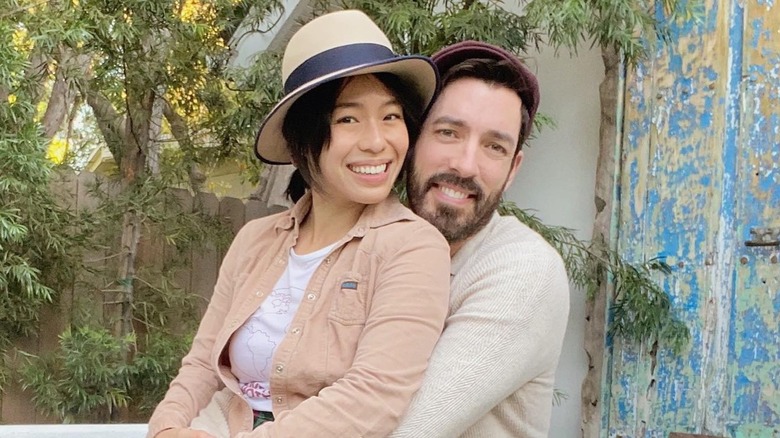 Linda Phan and Drew Scott smiling