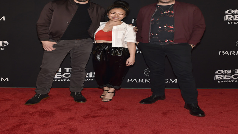 Drew Scott, Linda Phan, and Jonathan Scott smiling