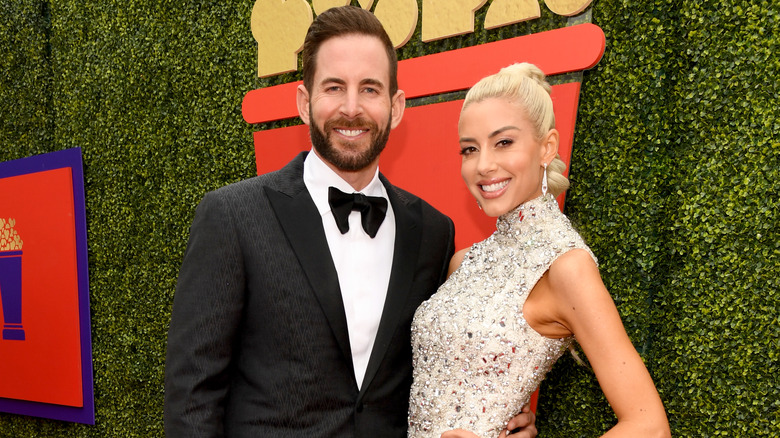 Tarek El Moussa and Heather Rae Young attend the 2021 MTV Movie & TV Awards