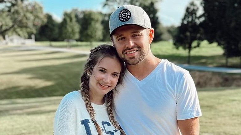 Jason and Maddie Grace Duggar on a golf course