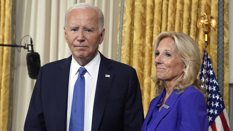 Joe Biden looking at the camera with Jill Biden