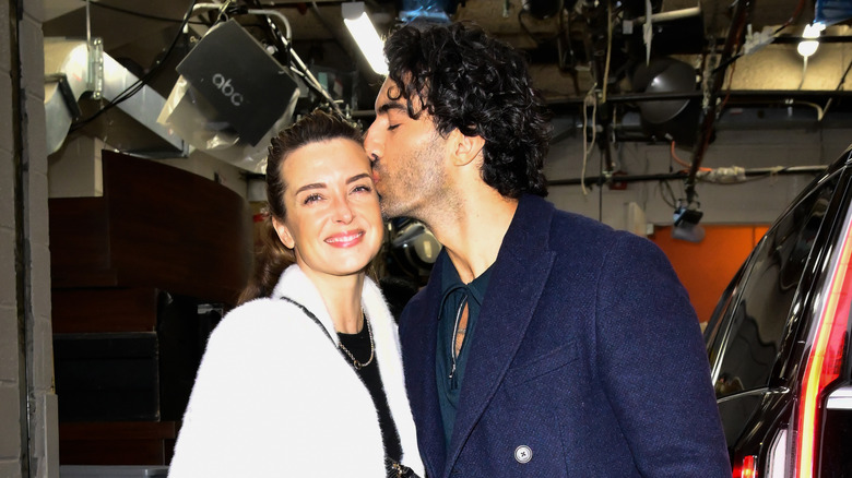 Justin Baldoni kissing Emily Baldoni