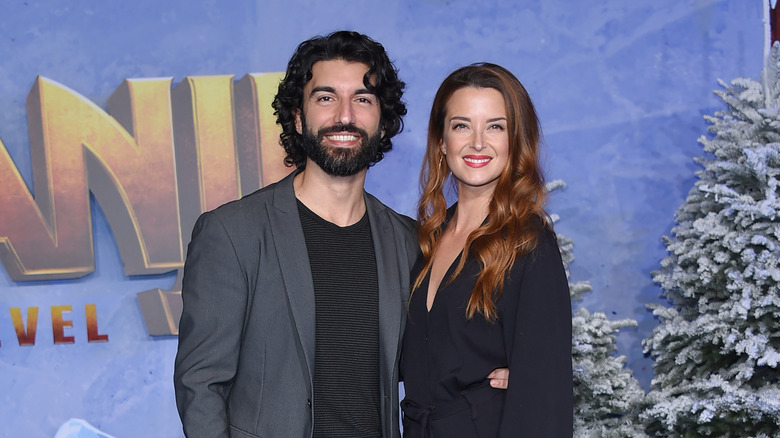 Justin Baldoni and Emily Baldoni posing together for a photograph