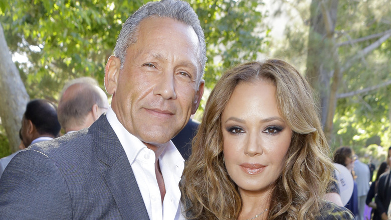 Leah Remini smiling with Angelo Pagan