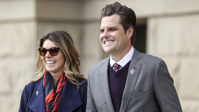 Ginger Luckey and Matt Gaetz smiling walking together