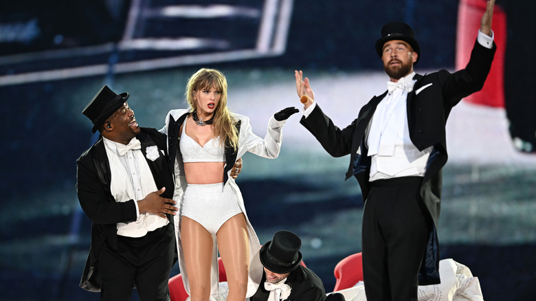 Travis Kelce on stage with Taylor Swift