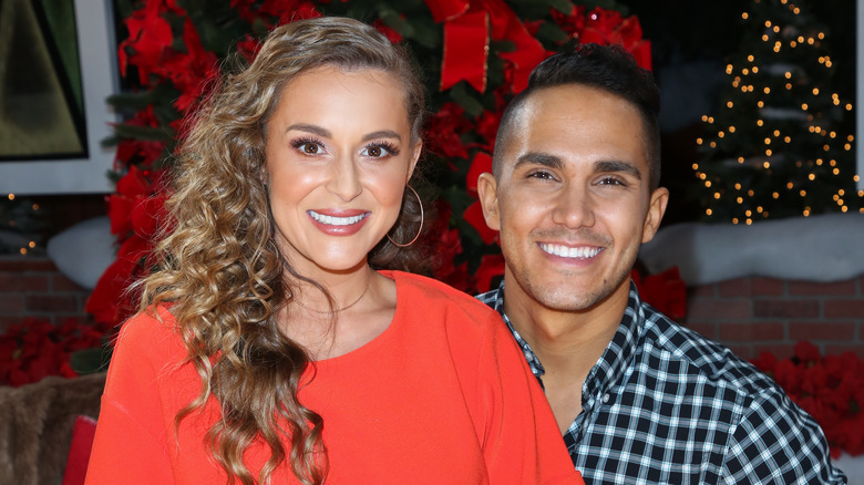 Alexa and Carlos PenaVega smiling together