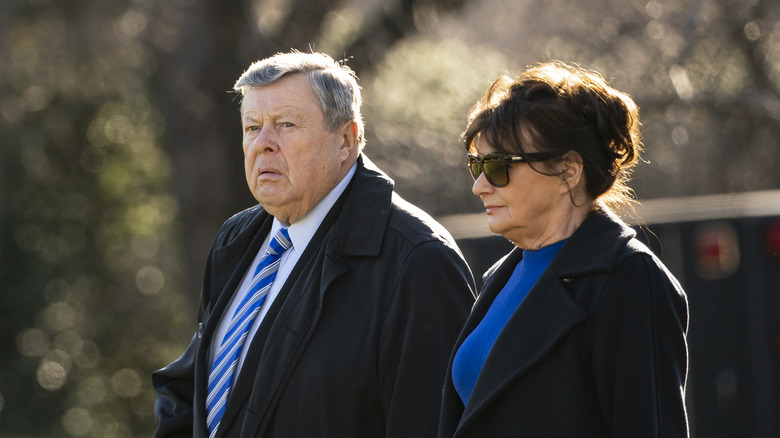 Melania Trump's parents looking gruff