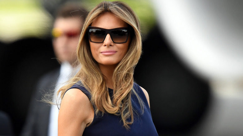 Melania Trump looking inscrutable behind shades