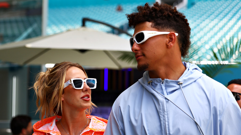 Brittany and Patrick Mahomes in white sunglasses