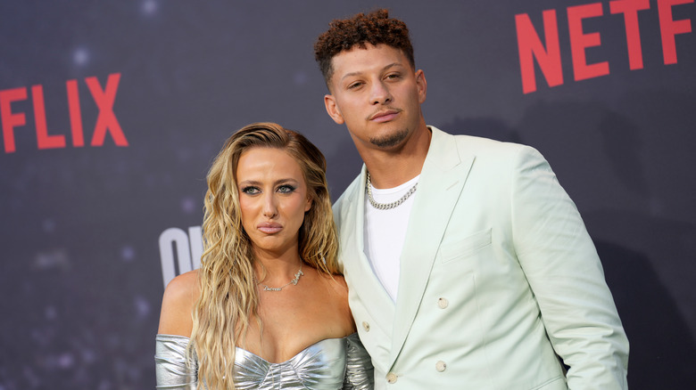 Brittany and Patrick Mahomes posing together