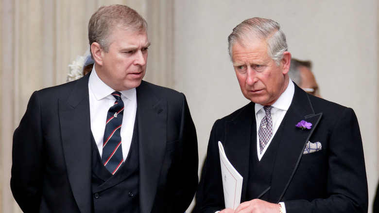 Prince Andrew in conversation with King Charles III