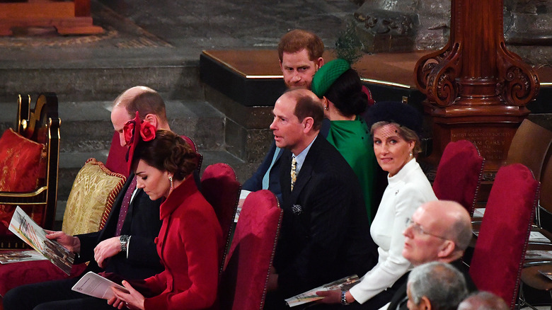 Prince Harry and Meghan Markle sit by Duke and Duchess of Edinburgh