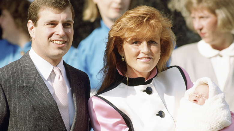 Prince Andrew & Sarah Ferguson holding Princess Eugenie