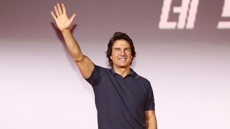 Tom Cruise waving to an audience