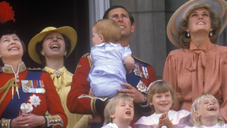 The royals looking up on Buckingham Palace balcony