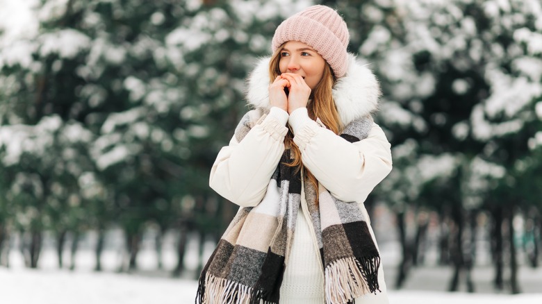 Woman outside in the snow