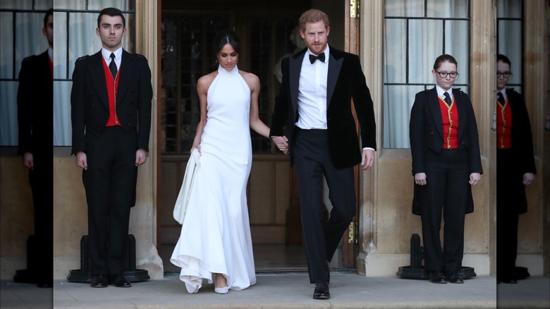 Harry and Meghan holding hands