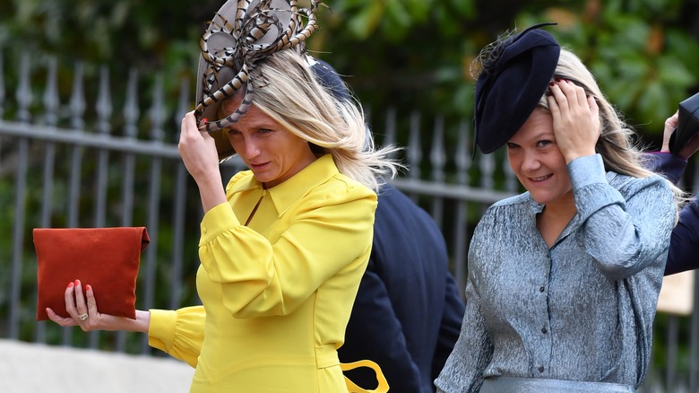 Royal wedding guests with fascinators 