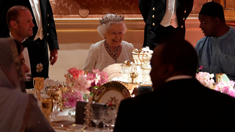 Queen Elizabeth attending a dinner