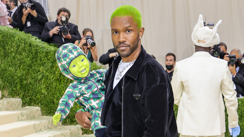 Frank Ocean holding robot baby at Met Gala