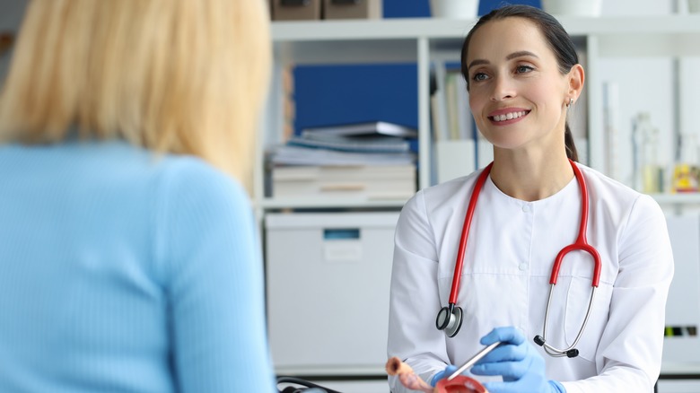 Doctor speaking to patient