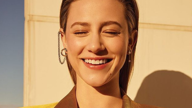 Lili Reinhart laughing with her eyes closed