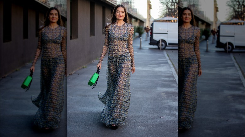 Woman wearing sheer maxi dress