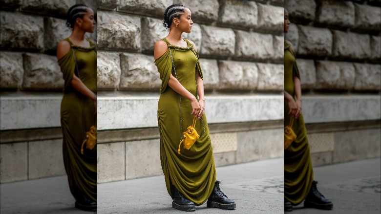 Woman wearing maxi dress with boots