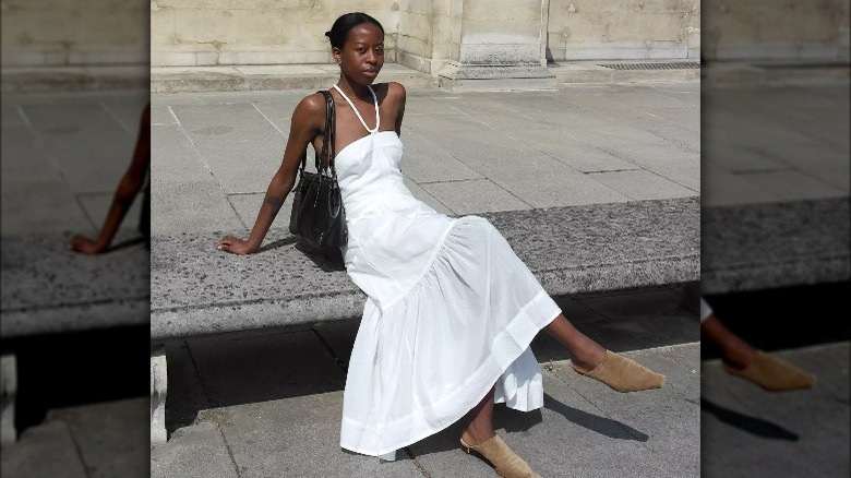 Woman in white maxi dress