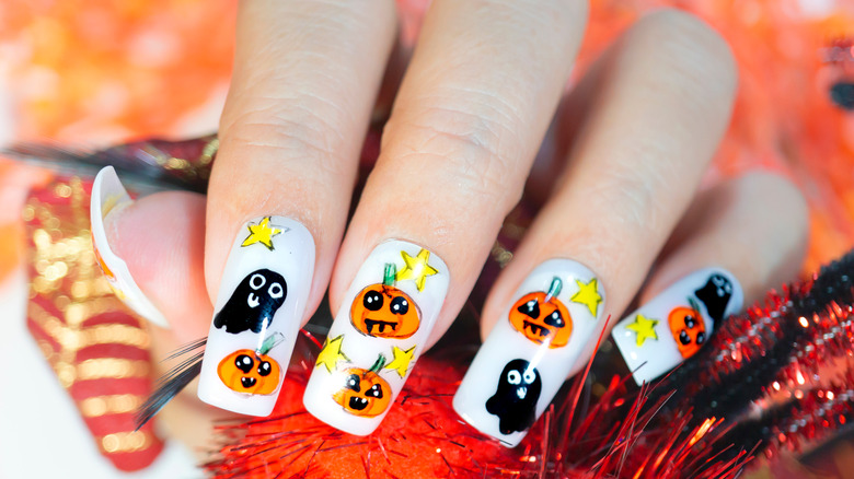 Halloween nails designed with decals