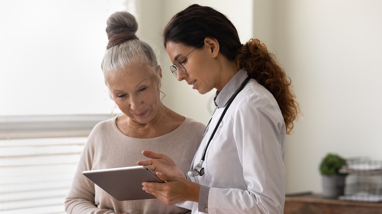 Doctor speaking to patient