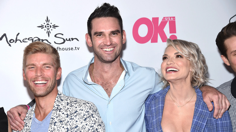 Carl Radke laughing on red carpet with Kyle Cooke and Lindsay Hubbard 