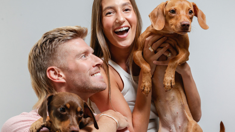 Amanda Batula with Kyle Cooke and their two dogs