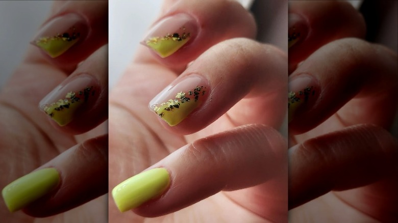 Yellow and gold nail art